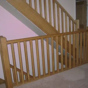 Bespoke wooden hand rails by Milland Joinery