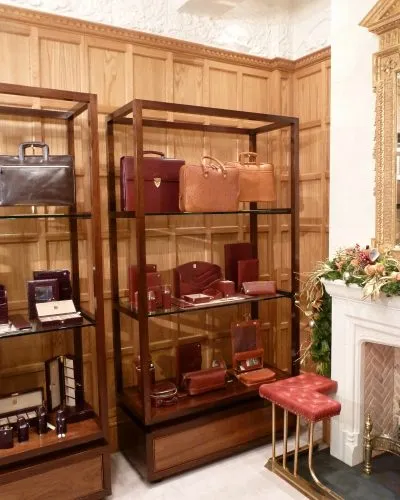 Bespoke wooden cabinets for Aspinal shop