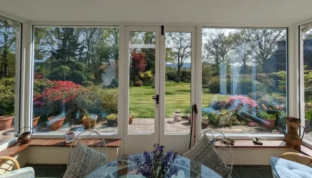 Recently installed new full height windows & doors in this sun room, which has made a massive difference to the view over the garden. Absolutely beautiful on a sunny day like this ☀️
.
.
.
#joineryworkshop #joinery #carpentry #woodenwindows #woodendoors #sunroom #homeimprovements #panoramicview #gardenviews #sunguardglass #sapeletimber
