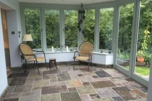 Bespoke wooden conservatory by Milland Joinery