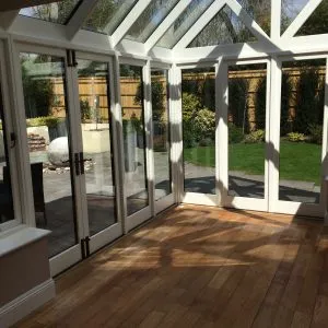 Bespoke wooden conservatory by Milland Joinery