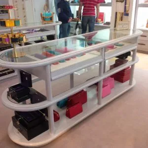 Bespoke wooden display cabinets for Aspinal shop
