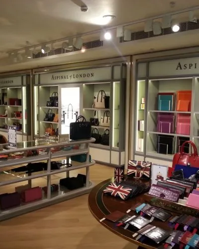 Bespoke wooden display cabinets for Aspinal shop