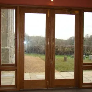 Bespoke wooden church doors by Milland Joinery