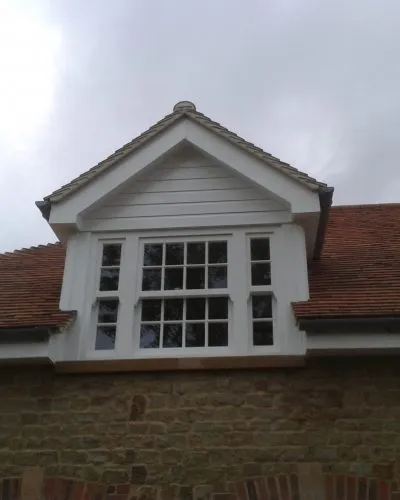 Bespoke wooden windows by Milland Joinery