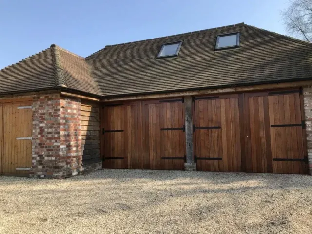A beautiful pair of garage doors installed for a very loyal customer. These are made in Sapele hardwood, with Osmo oil applied giving it this beautiful deep colour. Really pleased with how these turned out. 
.
.
.
#joinery #joineryworkshop #carpentry #craftmanship #skills #woodwork #wood #sapele #garagedoors #timber #homeimprovements
